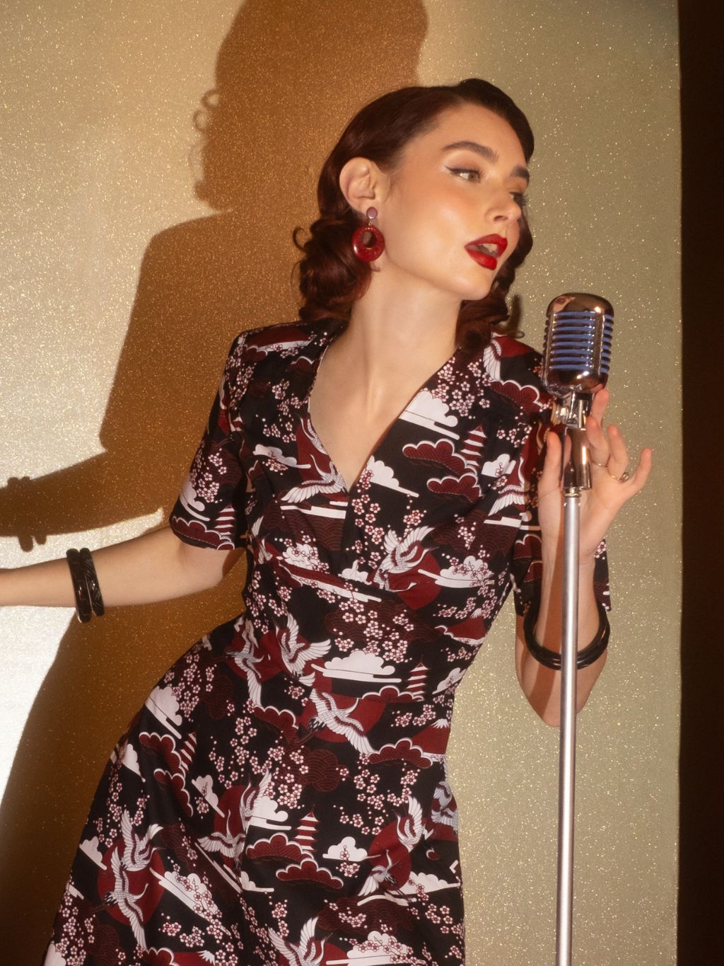 Close-up of delicate front pleating detail on Claret Crane Vera dress