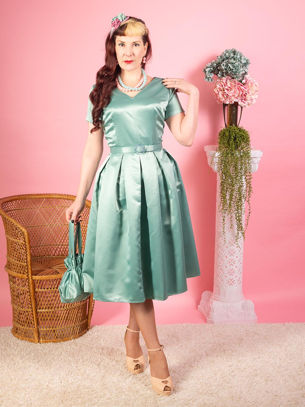 1950s pleated dress in pastel sage green satin with matching belt