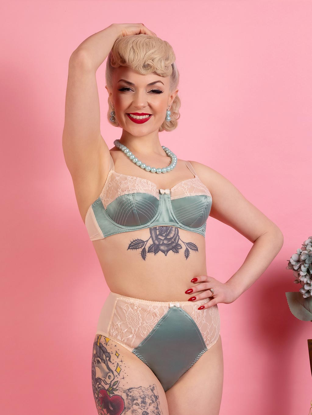 1950s high waist knickers in pastel sage green satin and peach lace worn with matching retro underwired bra