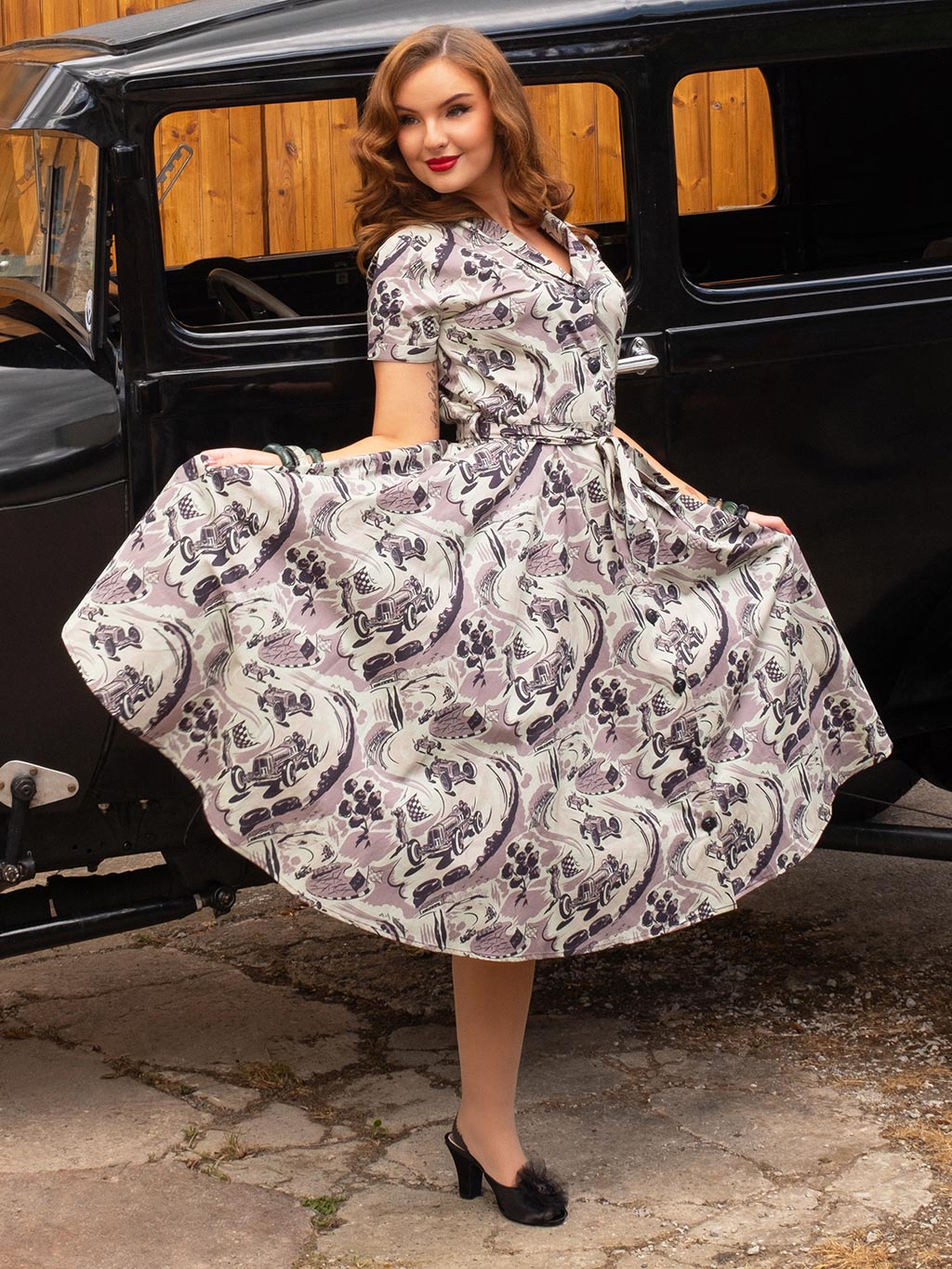 Full-length view of Lucy dress highlighting full skirt and shirt waist design