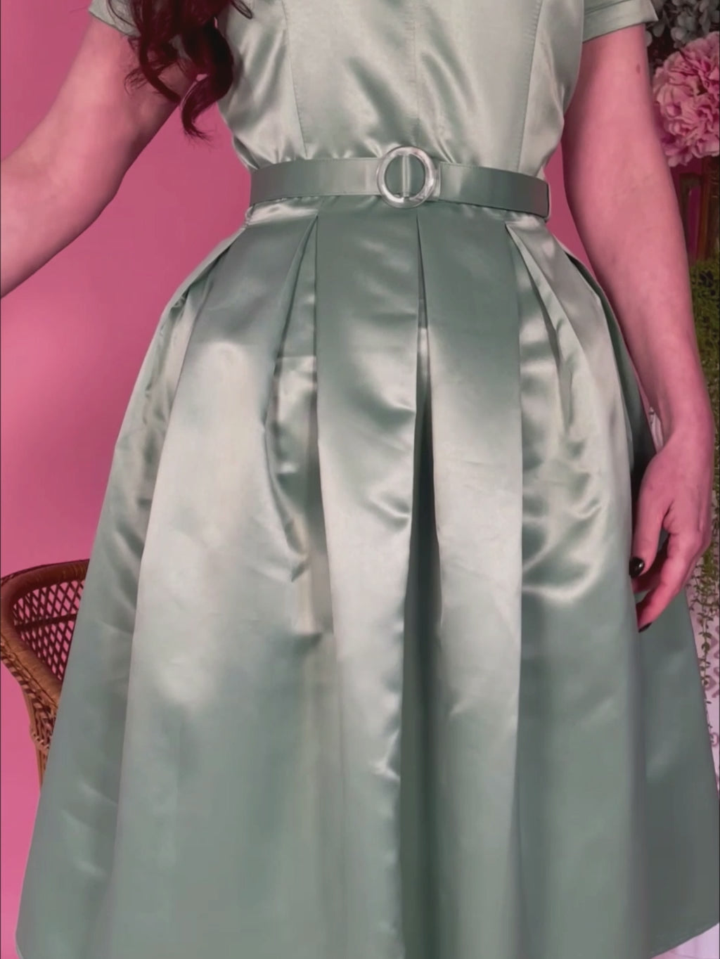 1950s dress with a box pleated skirt in pastel sage green satin