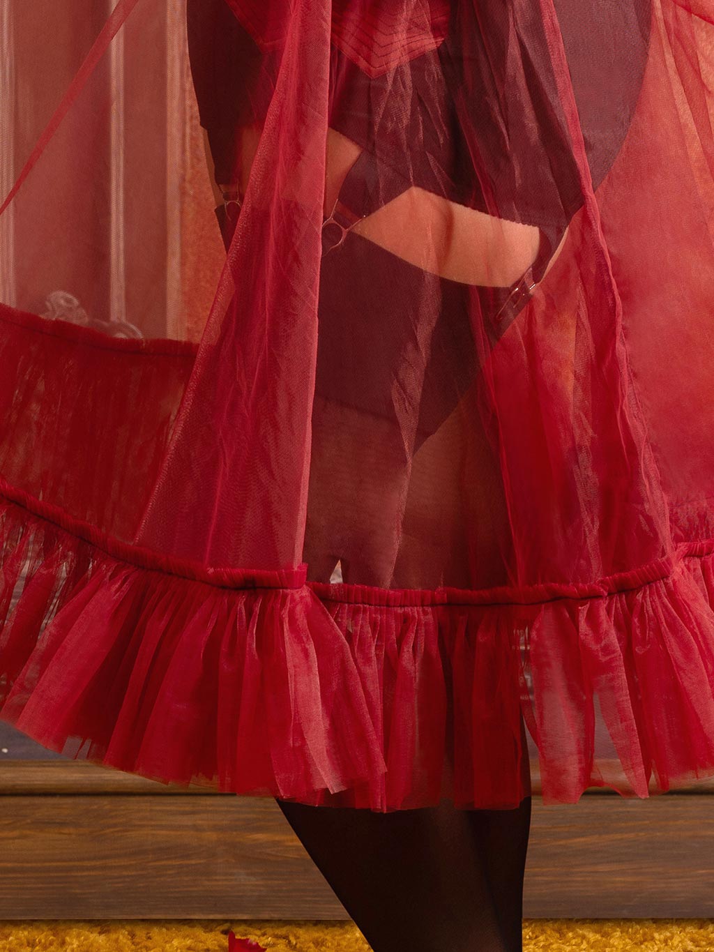 Close-up of sheer nylon copper petticoat frills and nylon construction detail