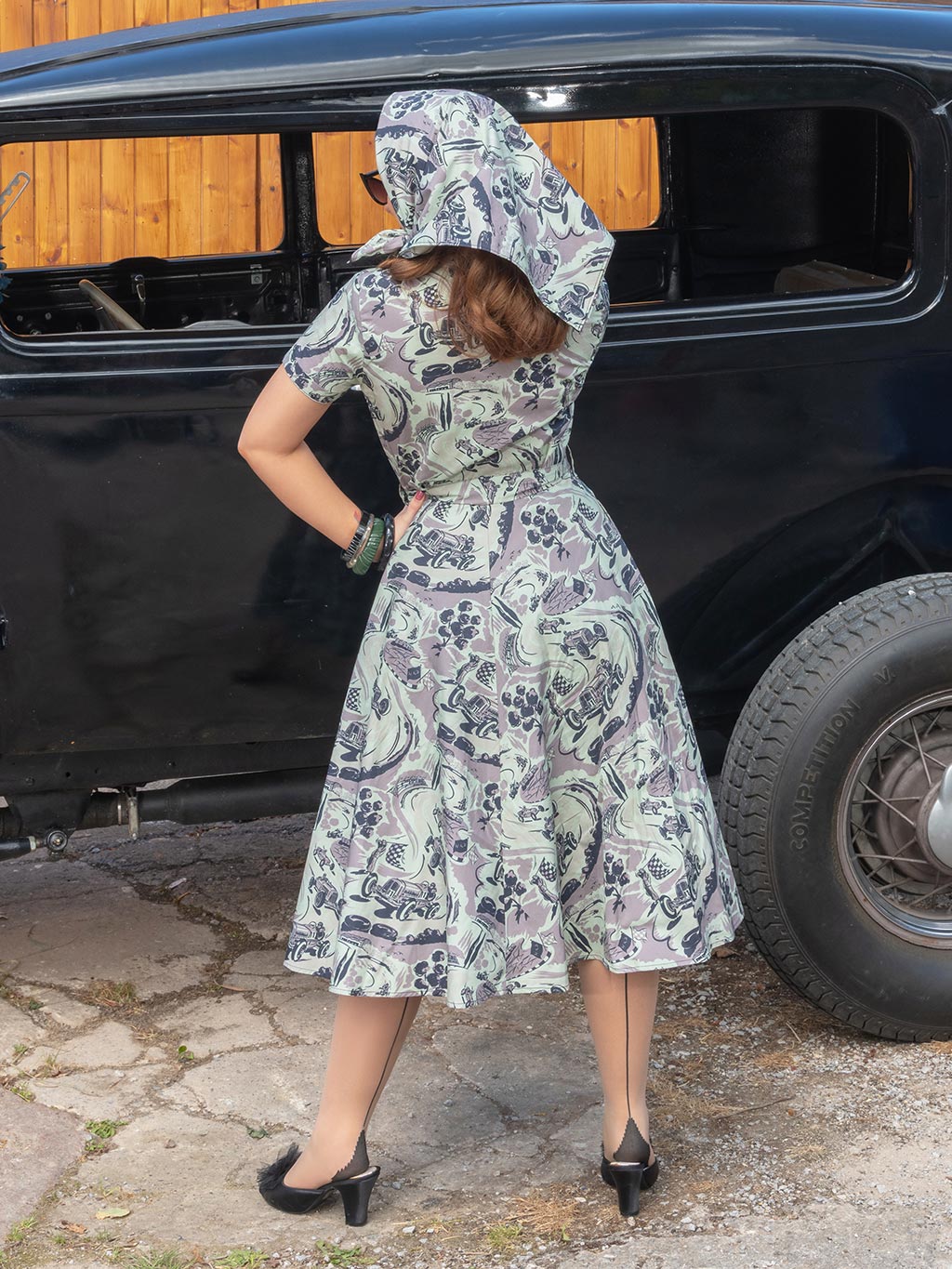 Back view of Lucy dress revealing classic 1950s-inspired cu